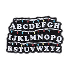 Pin Stranger Things pared alfabeto guirnalda