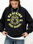 Sudadera de cuello redondo Stranger Things Hawkins High School tigre