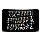 Tapiz bandera Stranger Things pared alfabeto noche