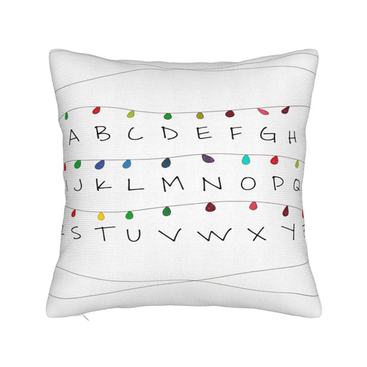 Housse de coussin Stranger Things guirlande alphabet blanche vu de face