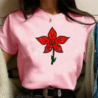 Camiseta de mujer rosa Stranger Things corola del Demogorgon