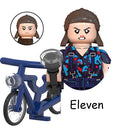 Minifigura para construir Stranger Things Once y su bici azul